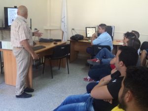 Msc. Lino Rodríguez exponiendo en FLISOL JCCE